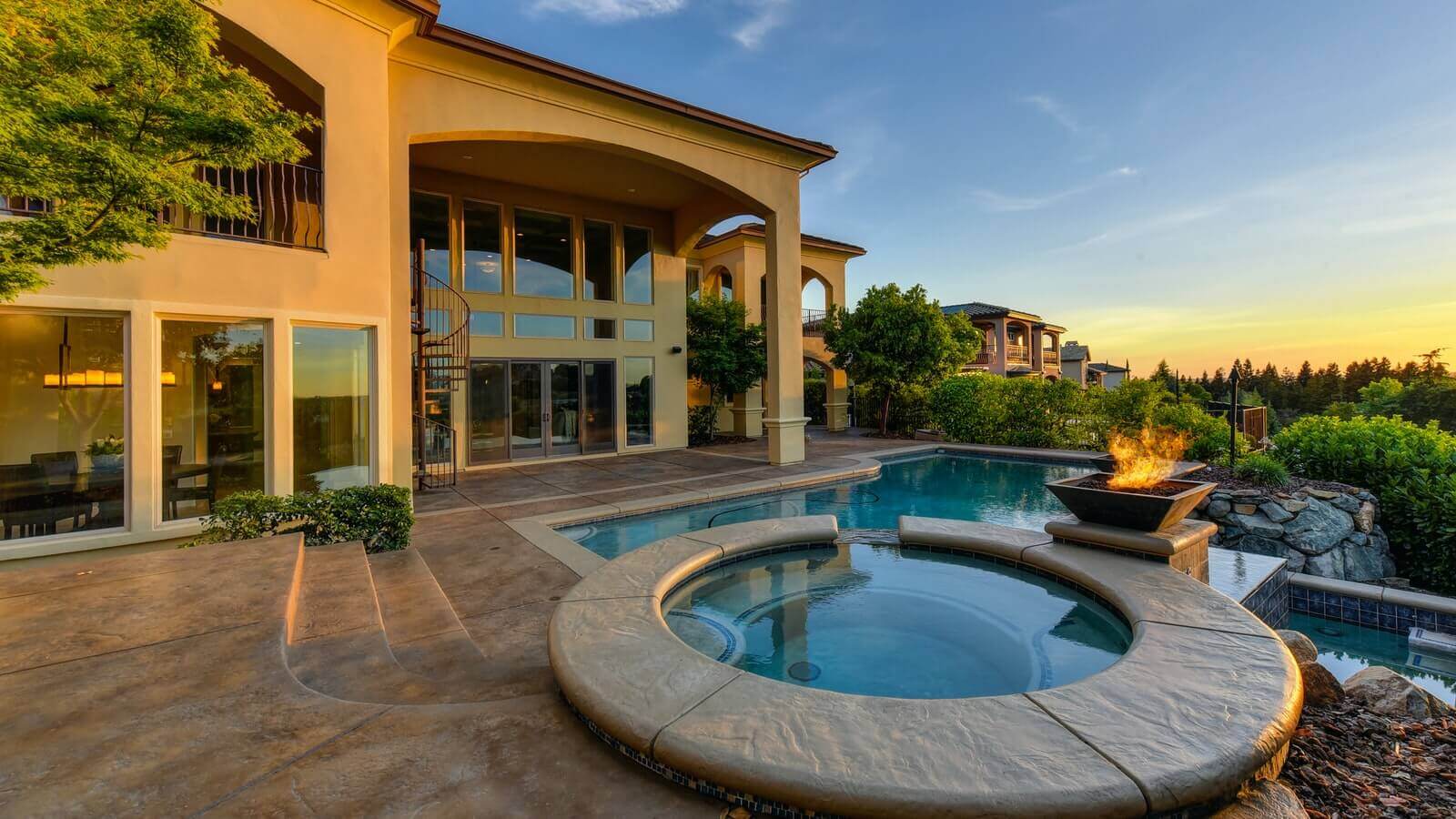 A view of a beautiful zen garden in the backyard of a home